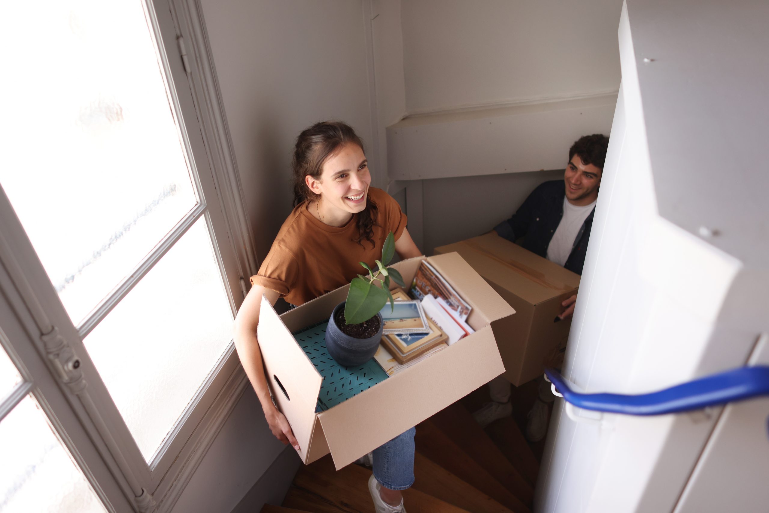 a-happy-young-couple-moving-into-a-new-apartment